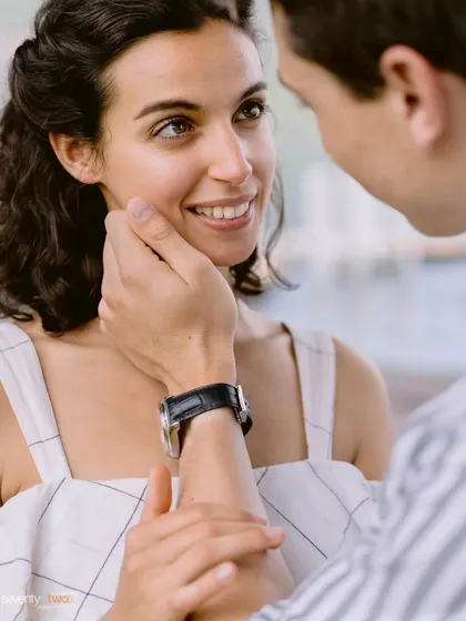 A gentle touch, a loving gaze. This intimate close-up captures the tenderness and deep connection that has grown over a decade and across continents.