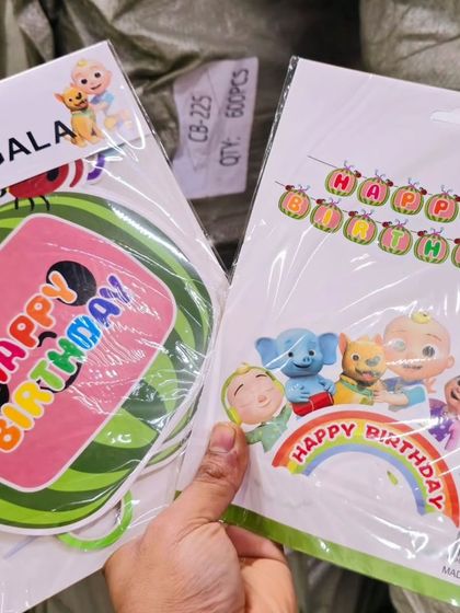Here is a look at some of the Cocomelon themed party supplies I stock. This includes 'Happy Birthday' banners and other decorative items to create a cohesive look.