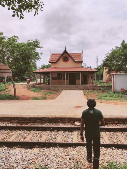 Exploring an old railway station is part of our Devanahalli Heritage Ride. We combine scenic cycling with visits to unique historical spots.