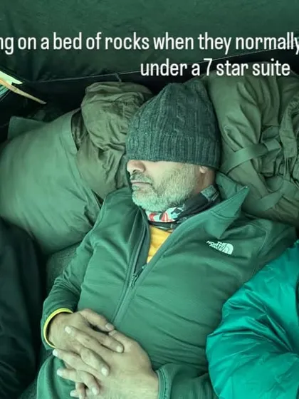 Sleeping on a bed of rocks when you're used to a 7-star suite. The mountains teach you humility and the joy of simple things. This is the real vibe of an expedition.