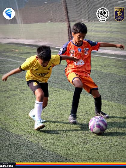A player shields the ball from an opponent. This image from Pune shows the strength and tactical sense we develop.