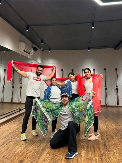 Posing with our props after a fun-filled Holi dance session.