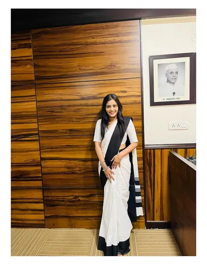 In my office, a space I built through perseverance. The portrait of Jawaharlal Nehru in the background is a reminder of the nation's legal foundations.
