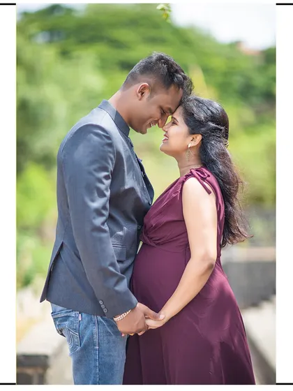 An intimate forehead-to-forehead pose, capturing the deep connection between the couple.