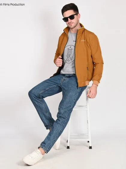 We provide professional model photoshoots for men's apparel, delivering clean, stylish, and catalogue-ready images. This shot effectively showcases the fit and style of a men's jacket for e-commerce listings.