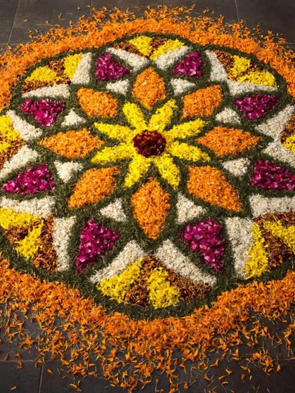 A beautiful flower rangoli (pookalam) made with thousands of fresh petals, a tradition especially popular during the Onam festival.