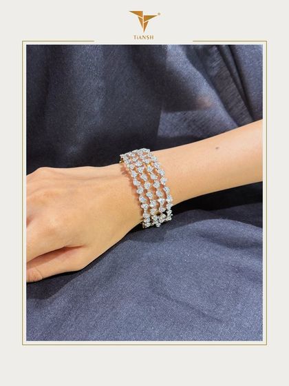 Another view of the three row diamond lattice bracelet, showing how it beautifully catches the light. It is a piece that combines grace and modern design.