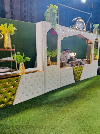 The elegant facade of the dessert section, featuring modern white tufted panels and gold accents.