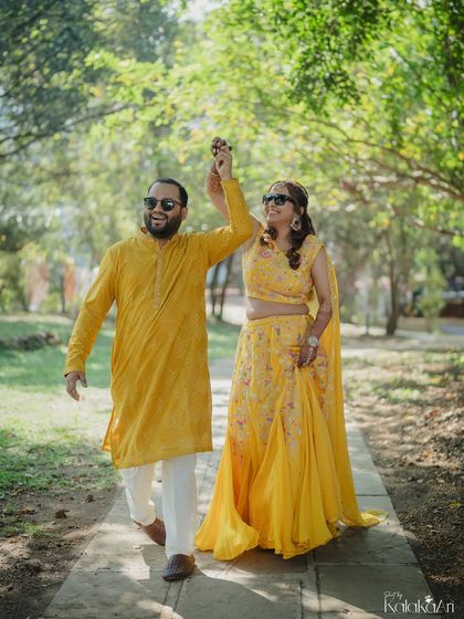 A fun and energetic shot of the couple dancing in a park. We love capturing the playful side of our couples.