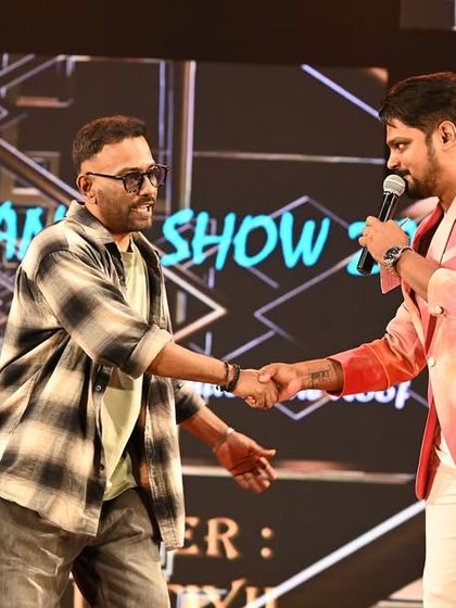 A handshake with choreographer Jai Kumar Kuttiyil, with Dharmesh sir alongside. I pride myself on building great professional relationships with artists and event organizers.