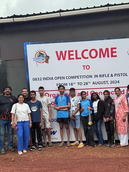 The full team, including coaches and parents, at the Open Competition in Goa. This support network is crucial to our success.