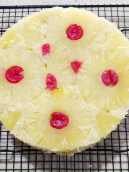 A classic pineapple upside-down cake, fresh from the oven and ready to be enjoyed.