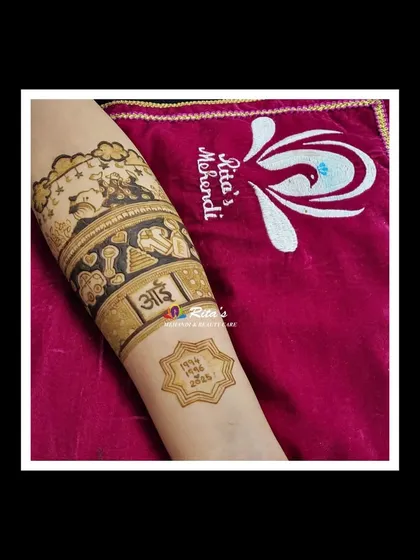 A baby shower mehendi design with 'Aai' (Mom) written in Marathi, surrounded by baby clothes, toys, and a sleeping baby under the stars.