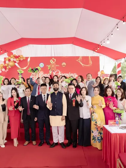 Waving to the crowd with fellow dignitaries at the VNYO Global Yoga Centre opening in Thanh Hoa City, Vietnam. International collaboration is key to spreading the message of yoga.