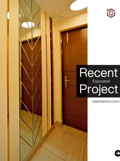 A simple and modern entryway with a chevron-patterned mirror that adds a touch of style and helps make the space feel brighter.
