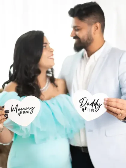 It's all about the fun and excitement of becoming parents. We use cute props like these "Mommy to be" and "Daddy to be" signs to add a playful touch to your couple's maternity shoot, capturing your happy smiles.
