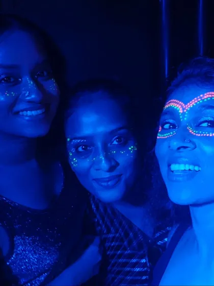 A cool shot from one of our glow in the dark themed nights. We used UV face paint to create a unique and vibrant atmosphere on the dance floor.