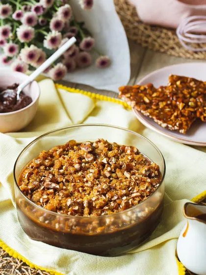 The full bowl of my chocolate salted caramel trifle, topped with a generous amount of crunchy almond praline.