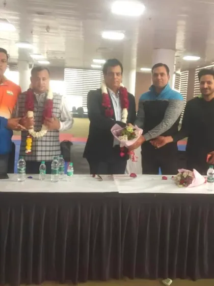 Posing with officials at the head table during the SGFI Delhi trials. Our oversight ensures that selections are fair and based on merit.