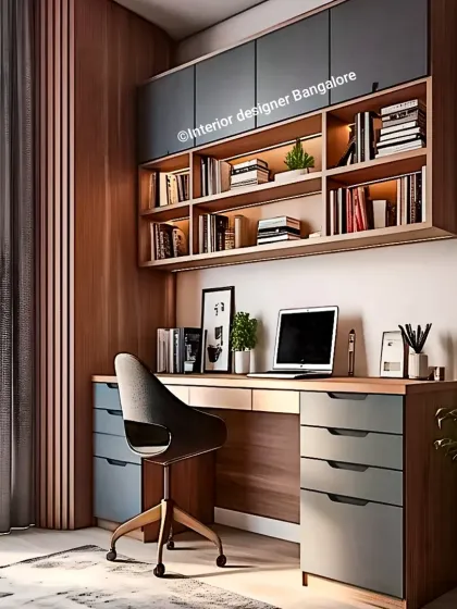 A modern home office setup with a spacious desk and plenty of storage. The design features a wall-mounted bookshelf with integrated lighting and sleek grey drawers, creating a productive and stylish environment.