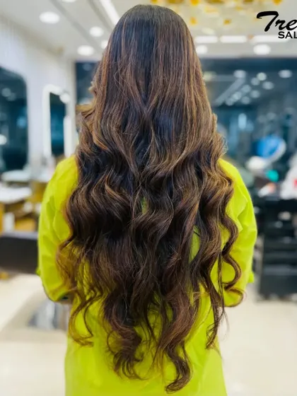 This is the definition of hair goals. We created these long, flowing waves with beautiful dimension and an incredible shine that reflects the health and quality of the hair after our expert treatment and styling.