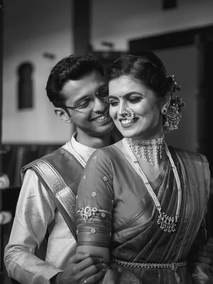 A quiet moment between Kinjal and Siddharth at the beautiful Dhepe Wada. This black and white portrait captures their gentle connection and the timeless feel of their heritage wedding venue.