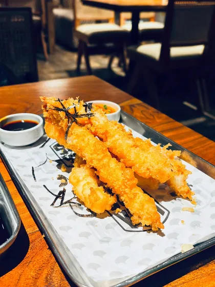 A delicious-looking plate of tempura prawns, beautifully presented.