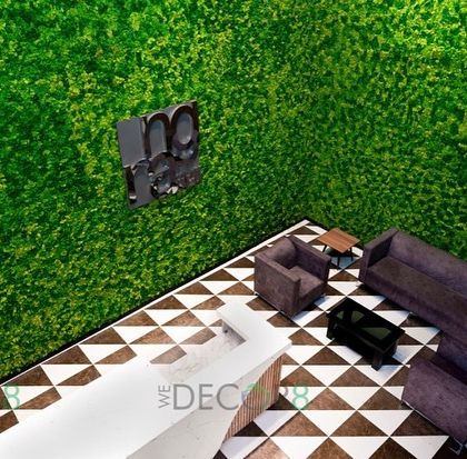 An aerial view of a reception area design concept, showing how a large moss wall can anchor the space. It demonstrates how biophilic design makes a powerful first impression on clients and visitors.