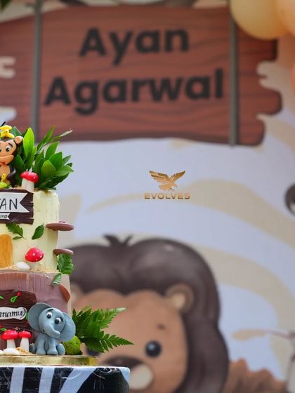 A close-up of the cake for a basic jungle-themed birthday party for Ayan. Even simple setups are executed with attention to detail.