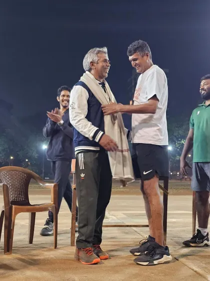 A moment of respect as one of our legends is honored by another senior member of the community.