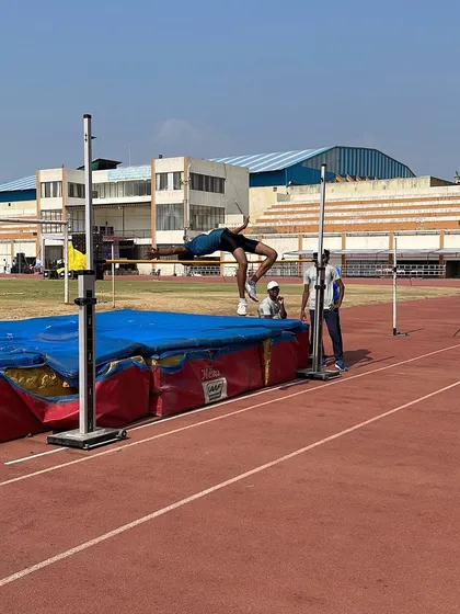 A high jumper in action, representing the extraordinary achievements we celebrate on World Athletics Day.