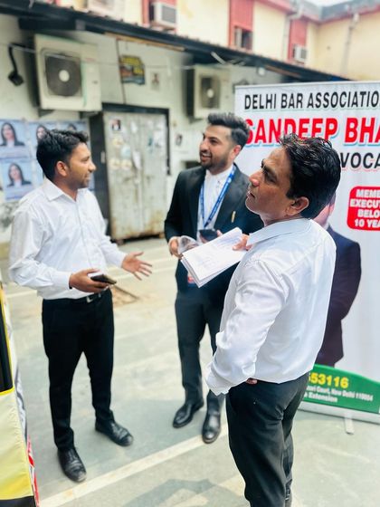 Another angle of a discussion with fellow advocates during a break.