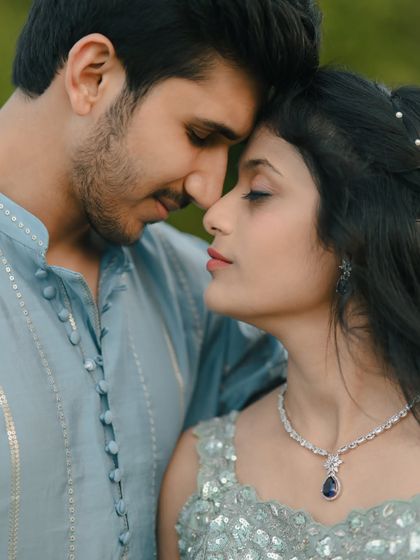 An intimate close-up capturing a tender moment between a couple. This kind of portrait focuses purely on the emotion and love shared between two people.