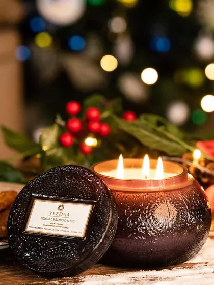 Immerse your senses in the feeling of celebration with our Bengal Bamboo & Fig fragrance. The rich, dark glass jar adds a touch of moody elegance to your holiday decor.