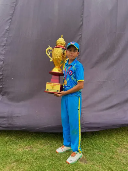 A little champ with a big trophy. The future is bright.