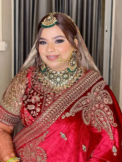 A happy bride ready for her big day. Her smile says it all. The makeup is set to last through all the smiles, tears, and celebrations, keeping her looking fresh and radiant.