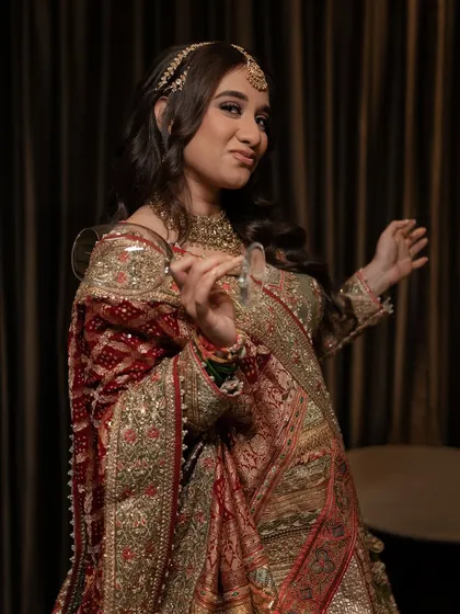 A playful bride making a fun gesture for the camera. It's important that my clients feel comfortable enough to be their quirky, authentic selves.