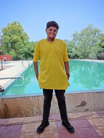 Dressed for a Haldi ceremony. As an event manager, I'm not just behind the console. I'm part of your celebration, ensuring every function, big or small, has the right energy and runs smoothly.