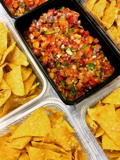 Perfect for a movie night or a casual get-together, you can order our homemade nachos with a side of spicy tomato salsa or our popular pineapple salsa. Everything is packed fresh and ready to enjoy.