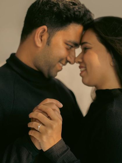 A close up shot focusing on the intimacy of holding hands and a gentle touch. We believe these small details tell a big part of your love story.