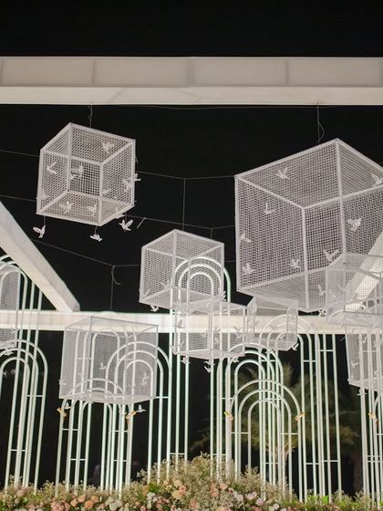 A unique overhead installation made from wire mesh cubes and birds, creating a sense of flight and freedom above the seating area. It’s all about creating unexpected moments of art.