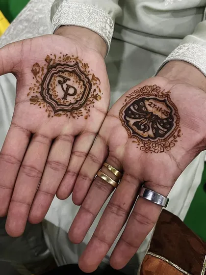 A classic and elegant choice for groom's mehendi. I designed these matching circular patterns, one with the couple's initials 'RP' and the other with their wedding date. This style is timeless and always looks so sharp.