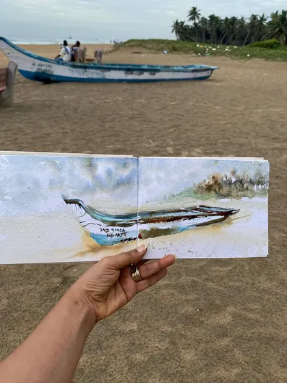 A plein air watercolor sketch of a boat on the beach in Pondicherry. Even though the sunrise was hidden by clouds, the beach never disappoints an artist.