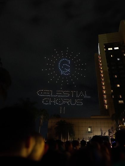 The "Celestial Chorus II" drone show lights up the sky in Zimbabwe. This image, taken from the crowd, shows how we can bring grand, thematic concepts to life across borders.