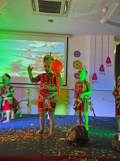 Students dressed as the 'vanar sena' enact a scene from the Ramayana, complete with props and dramatic flair.