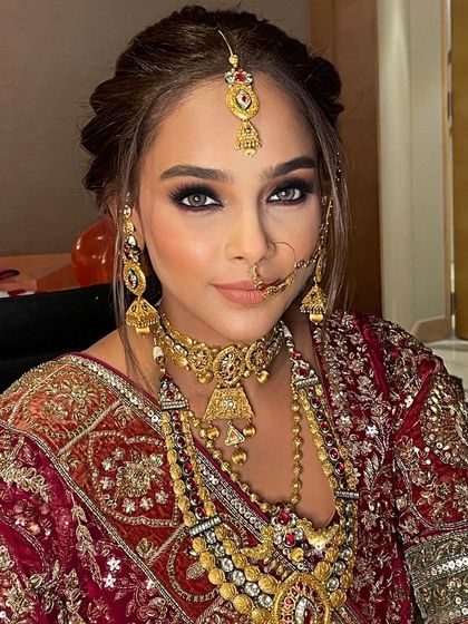 A close-up of the bride's stunning eyes and the detailed hairstyle.