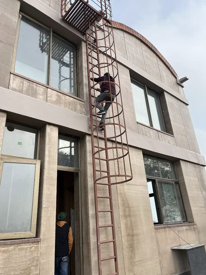 Work is in full swing at the Abohar Villa site. Here, a team member inspects facade details on this farmhouse-inspired residence. We are using local techniques and materials to create a design that is deeply connected to its semi-rural setting.