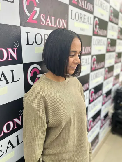 Another angle of the sleek bob, showing its versatility and timeless appeal. A great haircut can truly boost your confidence.