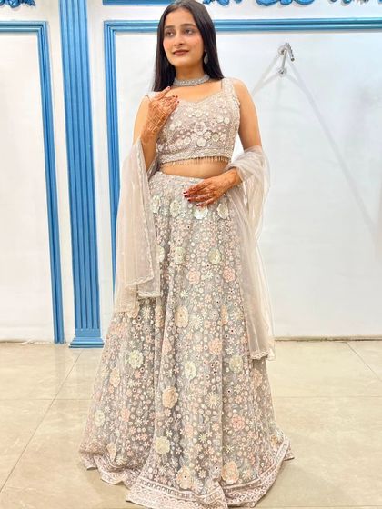 The mirror work mixed with floral embroidery adds a subtle sparkle to this beautiful outfit.