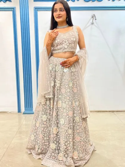 The mirror work mixed with floral embroidery adds a subtle sparkle to this beautiful outfit.